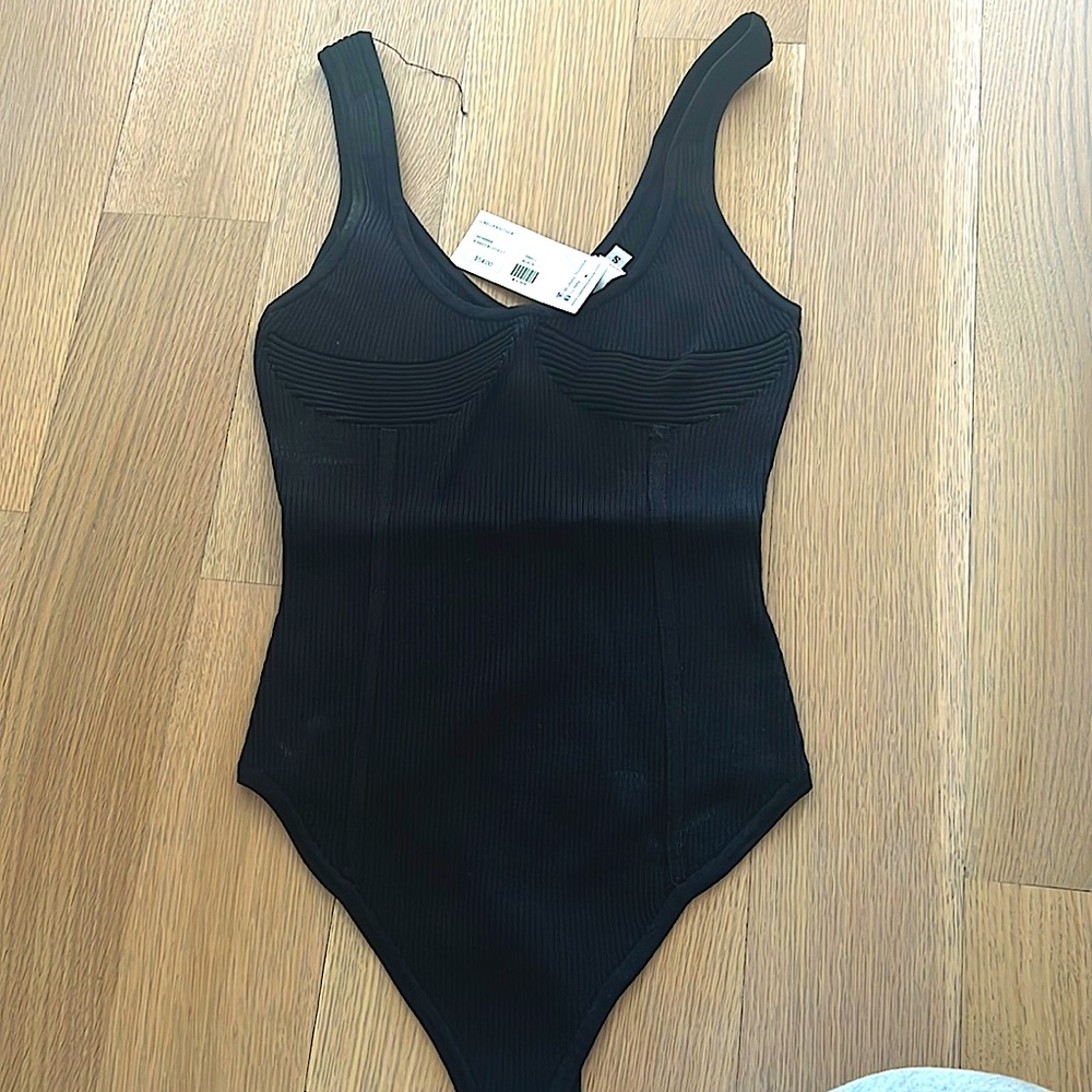 Knit bodysuit with rib detail and seaming